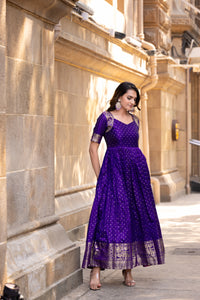 Elegant Purple Soft Silk Gown with Golden Border