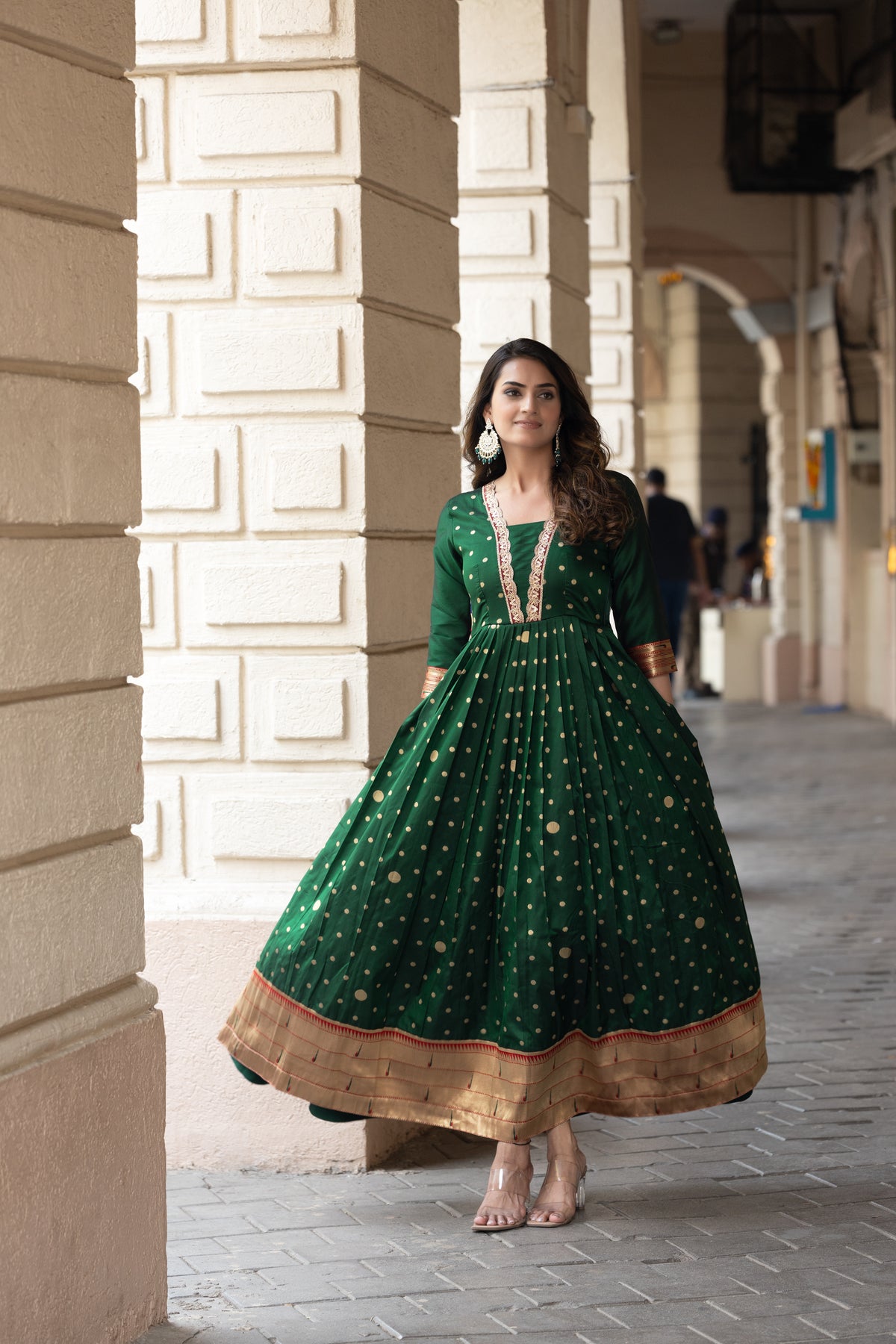 Elegant bottle green polka paithani flared gown