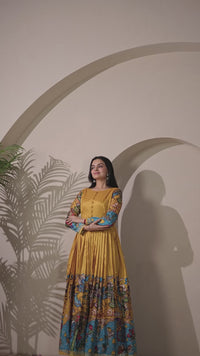 stunning flared yellow gown with pen kalamkari design