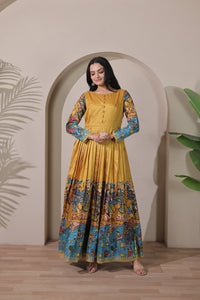 stunning flared yellow gown with pen kalamkari design